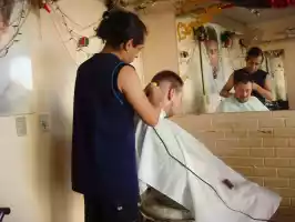 At the barbershop, Santeri getting rid of most of his hair