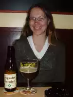 Päivi in Bar Le Cambridge drinking world-famous Belgian trappist beer Rochefort Päivi in Bar Le Cambridge drinking world-famous Belgian trappist beer Rochefort