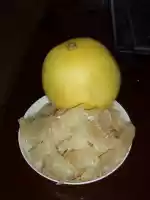 This is a pomelo fruit, its like grape but not so sour and much bigger