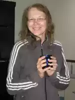 Päivi enjoying company and tea