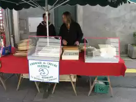 Cheese for sale in the Saturday market in Aubusson