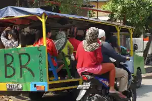 Jakarta traffic is jammed and chaotic. This is a local tourist tour bus