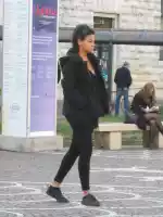 A woman in black