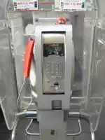 Secured telephone booth in Naples