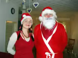 Santa is ready to go with Tia the elf