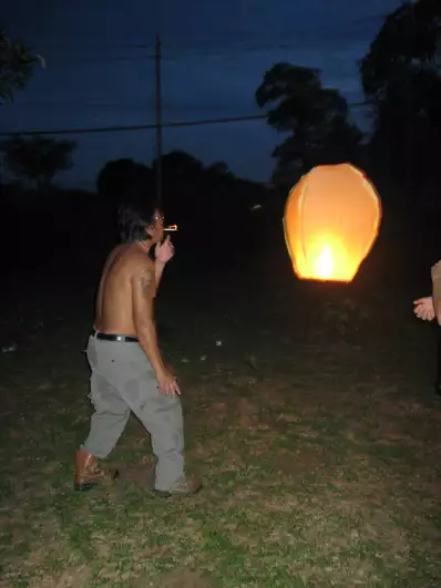 Our landlord Justin lighting up a typical Thai hot air balloon