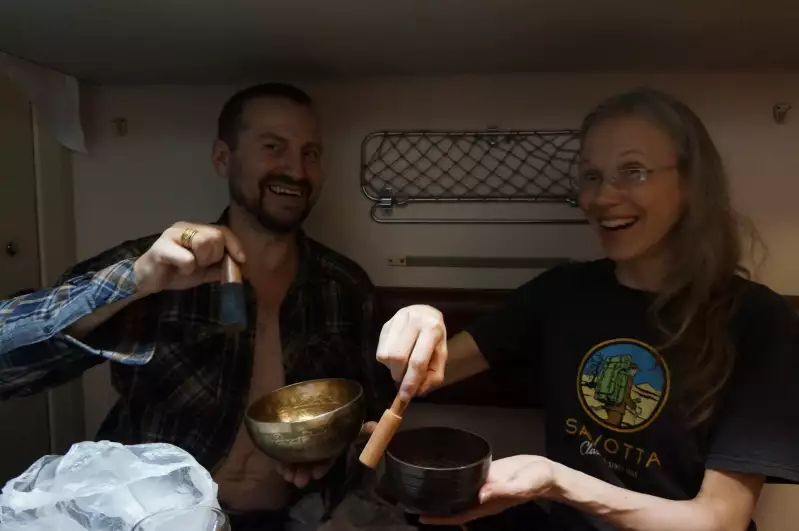 Playing singing bowls with Andy in a Russian train