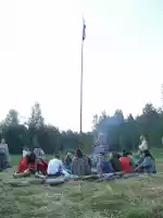 Drumming at the rainbow flag post