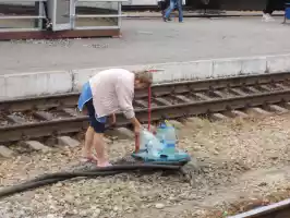 Good business filling water bottles at the fire post in the station and then selling the bottles to customers