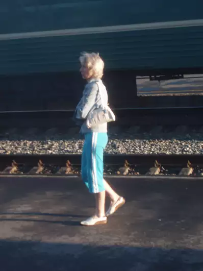 A typical train outfit (knee-length trousers and slippers)