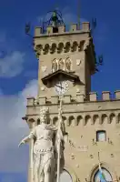 Golden saints on top of the clock