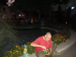 A watermelon dinner before boarding on the bus in Tirana (heading to Macedonia)