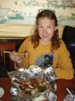 Päivi enjoying yak