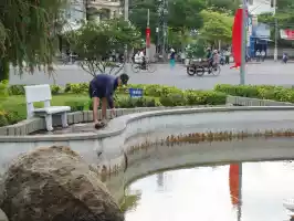 A park and a man at work